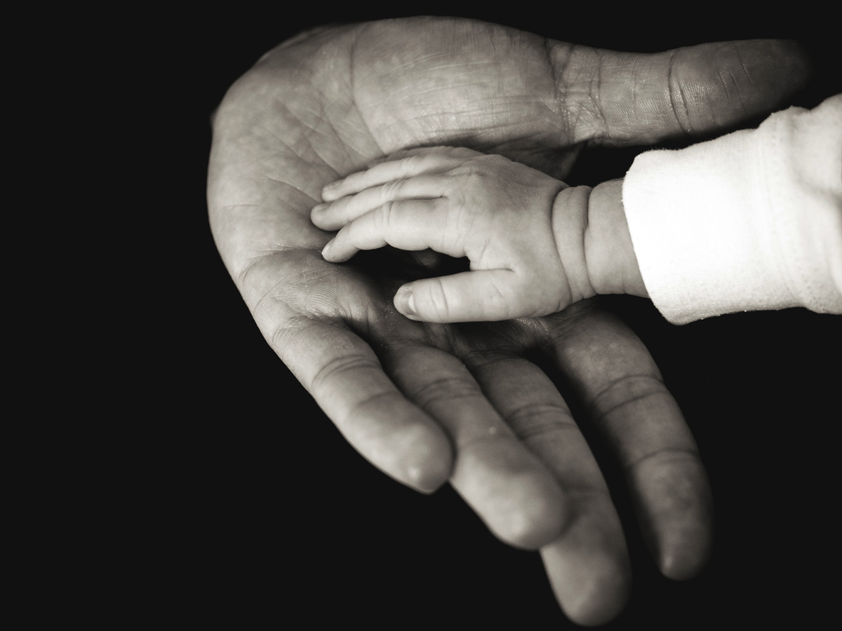 mother and baby's hands